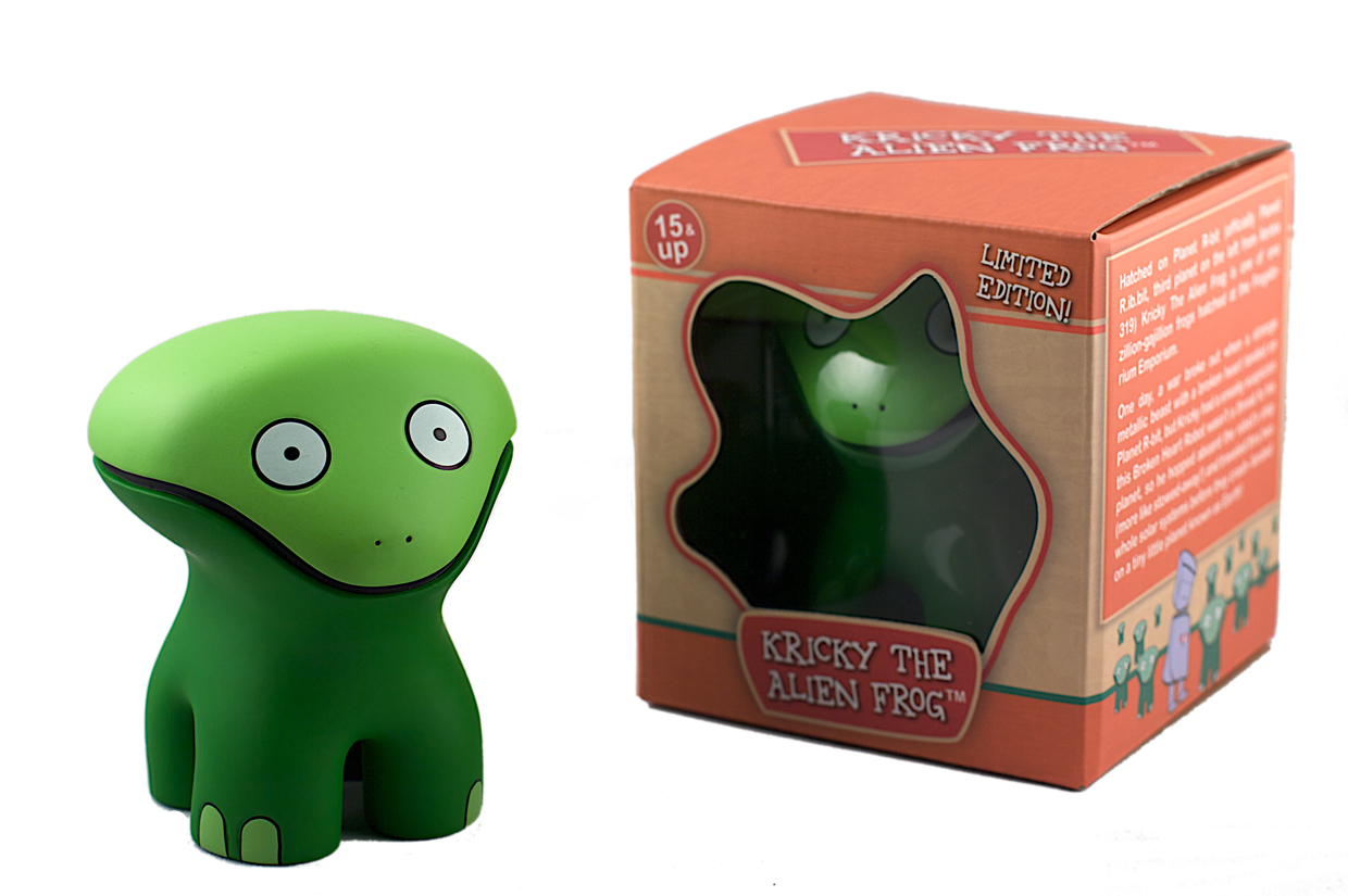Kricky the Alien Frog green vinyl toy beside its limited-edition box